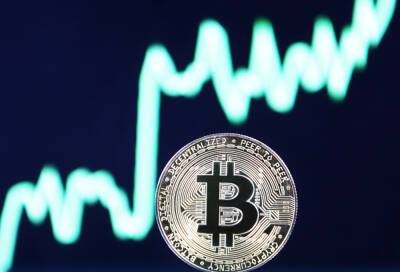 Bitcoin jumps to new record above $65,000 after landmark U.S. ETF launch