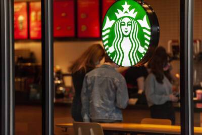 Stocks making the biggest moves midday: Starbucks, Apple, Amazon, U.S. Steel and more