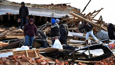 Rescue crews comb through wreckage after tornadoes rip through central US