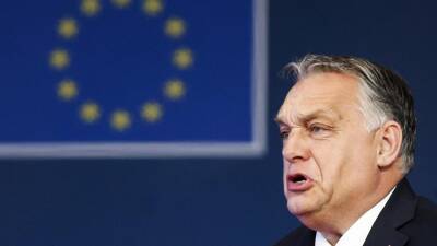 Orban says Hungary will defy EU court ruling on asylum policy