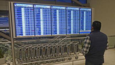 Thousands of flights cancelled worldwide as Omicron spread affects Christmas plans