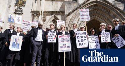 Barristers in England and Wales vote to end strike action