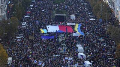 Ukraine war: Huge pro-Kyiv rally in Prague, more Russian missile attacks, UK hacking claims