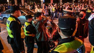 China: Calls for Xi Jinping to resign as rare COVID rule protests spread across major cities