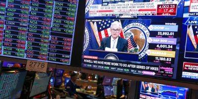 Wall Street and Fed Flopped in Trying to Predict 2022