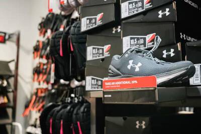 Stocks making the biggest moves midday: Under Armour, Zillow, Affirm and more