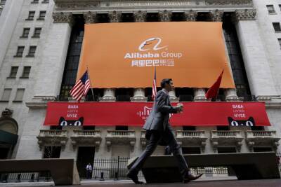 Stocks making the biggest moves midday: Alibaba, Apple, Robinhood and more