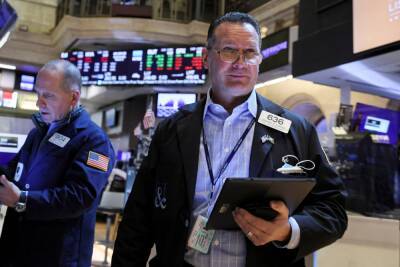 Dow futures fall 300 points as oil prices spike to 13-year high on Russia-Ukraine war
