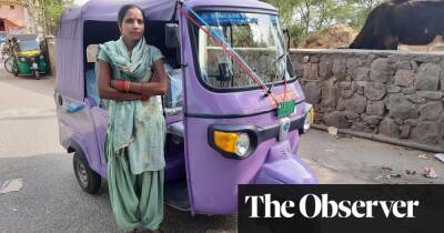Women with electric rickshaws combat Delhi’s toxic air – and its sexism