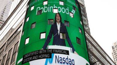 Stocks making the biggest moves premarket: Robinhood, Amazon, Apple, Roku and more