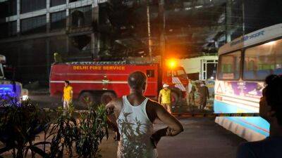 India: Police arrest company owners after building fire kills 27 in New Delhi
