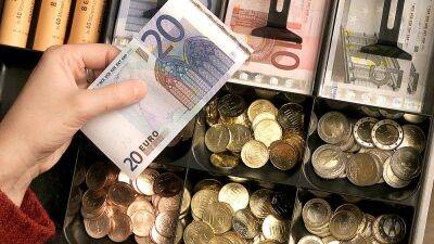 EU slashes growth forecast and predicts prices will rise faster than thought this year