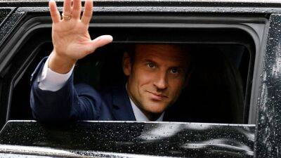Macron to meet political rivals in talks to form a working government