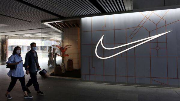 Stocks making the biggest moves midday: Nike, Las Vegas Sands, Boston Beer and more