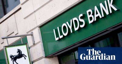 Lloyds profits take hit after more money put aside for defaults