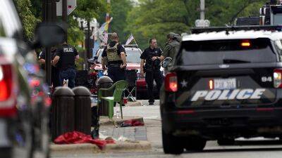 At least six dead in shooting amidst 4 July parade in Chicago suburb, gunman still at large