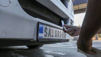 Kosovo government postpones number plate plan following Serb protests