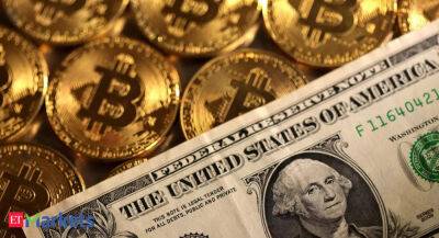 Bitcoin leaps above $21,000 as U.S. dollar sags