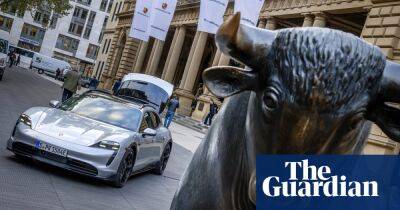 Porsche shares rise on first trading day in €75bn stock market float