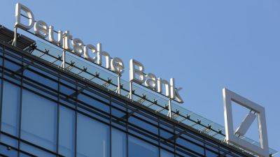 Deutsche Bank net profit slides 8% in third quarter but beats expectations