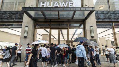 Huawei's revenue barely rose in the third quarter, despite phone and car sales growth
