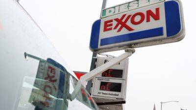 Stocks making the biggest moves premarket: Exxon Mobil, Lockheed Martin, Walt Disney and more