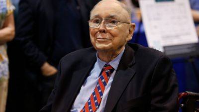 Charlie Munger says there isn't the slightest chance Buffett traded own account to enrich himself