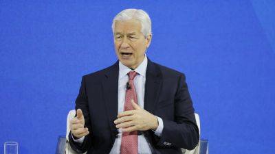 Jamie Dimon says JPMorgan Chase would exit China if ordered to