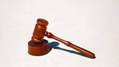 Judge dismisses class-action suit against Coinbase