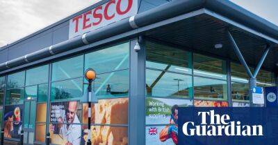Tesco profits halve amid ‘incredibly tough year for customers’