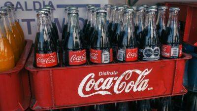 Stocks making the biggest premarket moves: Coca-Cola, First Solar, C3.ai and more