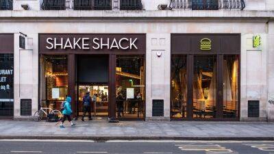 Stocks making the biggest moves midday: Shake Shack, Charles Schwab, Activision Blizzard and more