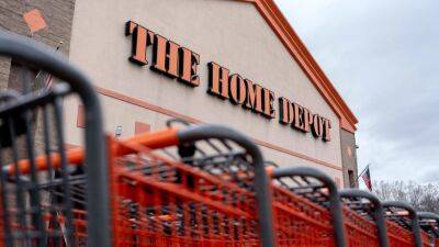 Stocks making the biggest moves premarket: Home Depot, Capital One, Dish Network & more