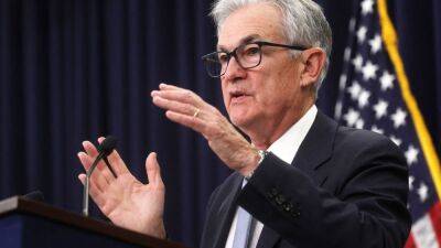 Fed increases rates a quarter point and signals a potential end to hikes