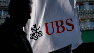 UBS says it has completed the takeover of stricken rival Credit Suisse