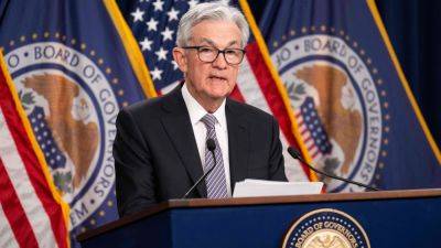 Fed holds off on rate hike, but says two more are coming later this year