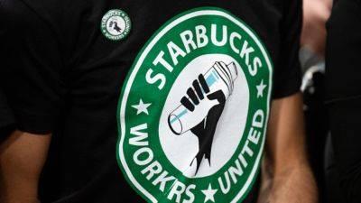 Stocks making the biggest moves before the bell: Starbucks, CarMax, Virgin Galactic and more