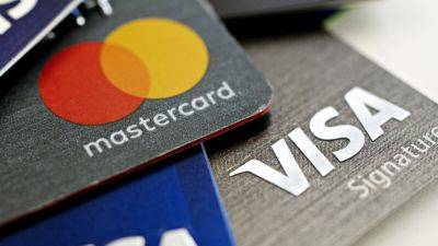 The fight over a bill targeting credit card fees pits payment companies against retailers