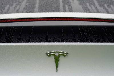 Tesla, Rivian stock surge hits short-sellers with $8bn in losses
