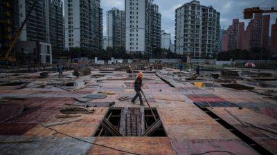 China's real estate market roiled by default fears again, as Country Garden spooks investors