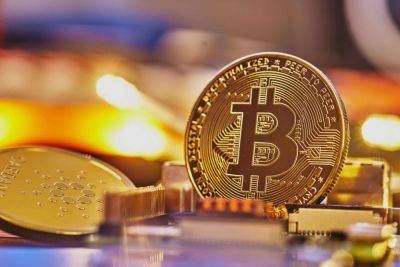 Bitcoin Surpasses $52,000, Crosses $1 Trillion Market Cap—What’s Driving The Surge?