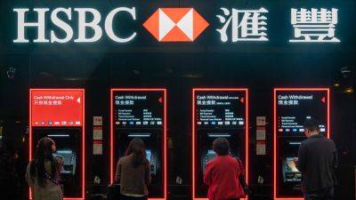 HSBC shares sink 3% after pre-tax annual profit misses estimates on impairment costs