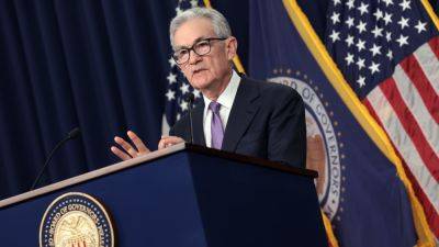 Fed holds rates steady and maintains three cuts coming sometime this year