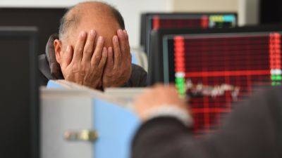 China's top securities regulator vows to 'strictly' crack down on market manipulators