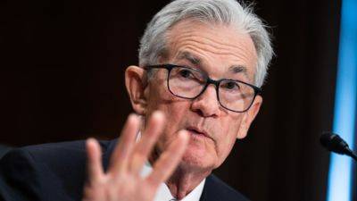 Powell says the Fed is 'not far' from the point of cutting interest rates
