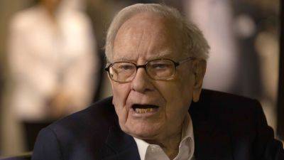 Apple shares drop 7% after Warren Buffett's Berkshire Hathaway slashes stake by half