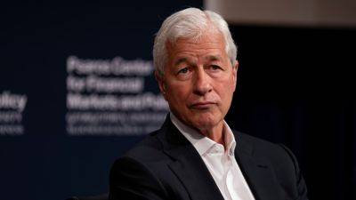 Jamie Dimon says Trump's tariff policy is positive for national security so people should 'get over it'