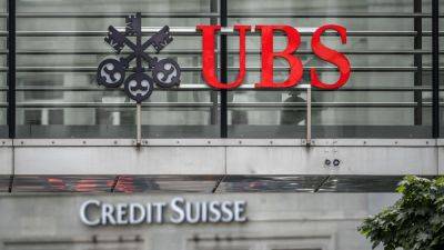 Swiss giant UBS posts $770 million in net profit, launches $1 billion share buyback in first half